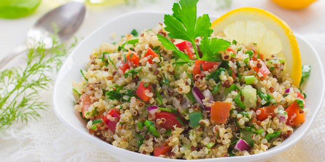 Tabbouleh salad with quinoa, parsley and vegetables bowl of quinoa