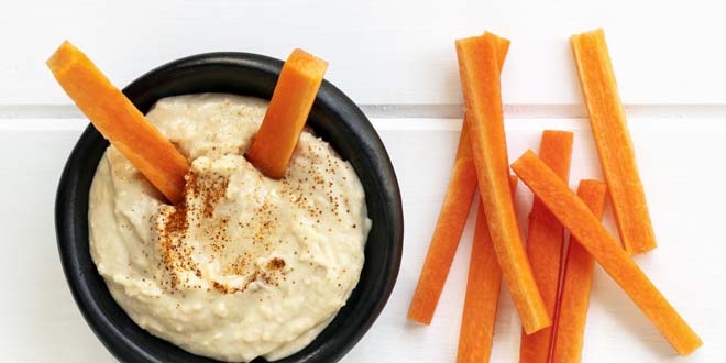 Hummus with Carrot Sticks Top View carrot