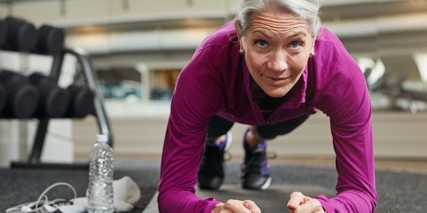 The true definition of fit and fierce Portrait of a mature woman working out at the gym